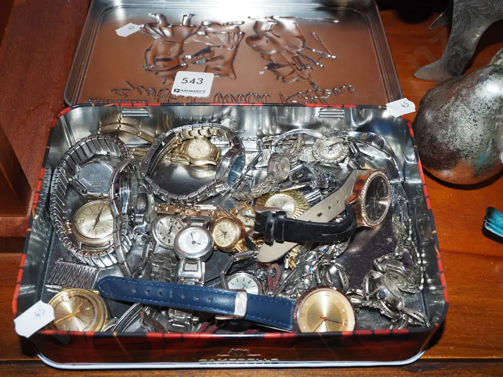 tin of watches Image 1++
