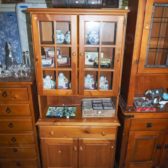 solid pine wall unit with 2 doors, 1 drawer and glazed doors with wooden astragals