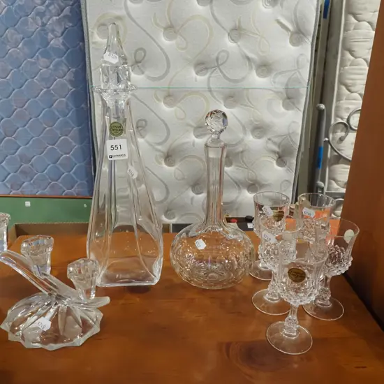 stoppered crystal decanters, candelabra, sherry glasses