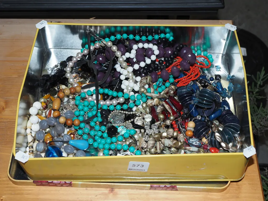 tin of costume jewellery Image 1++