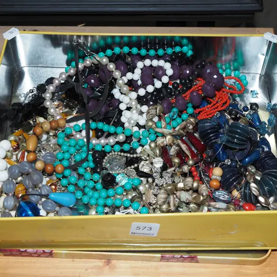tin of costume jewellery