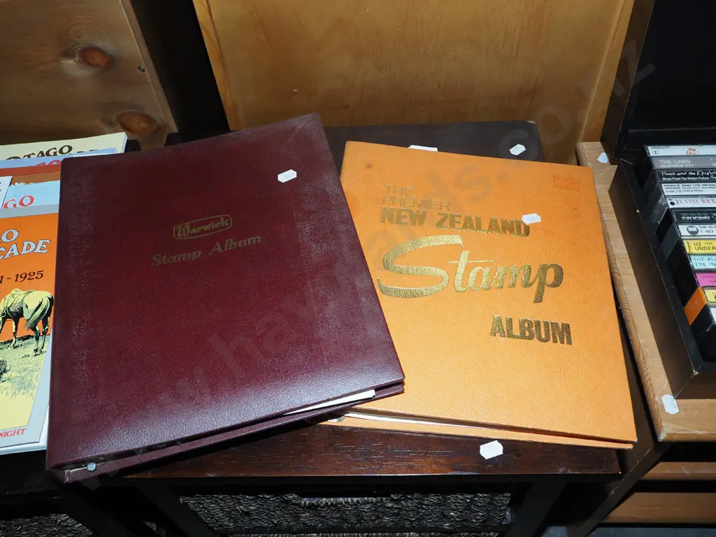 2x stamp albums Image 1++