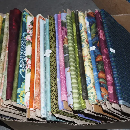 box of fabric pieces
