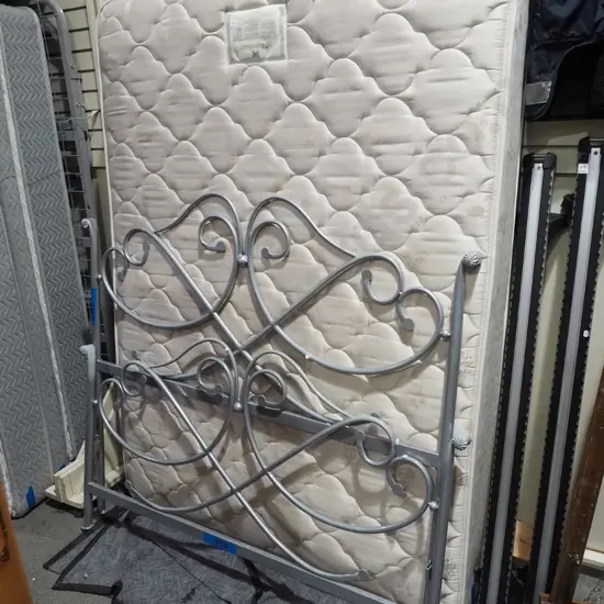 wrought metal double sized day bed with Sealey Napolean mattress