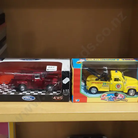 2x cast iron model trucks