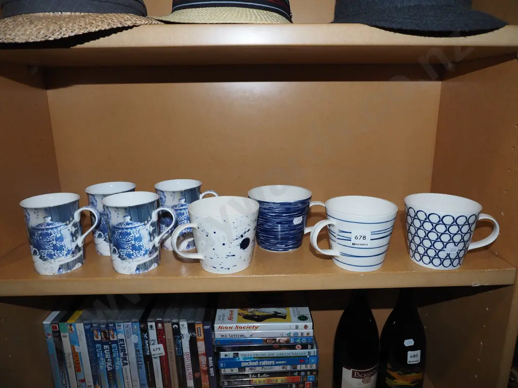 shelf of blue and white coffee cups Image 1++
