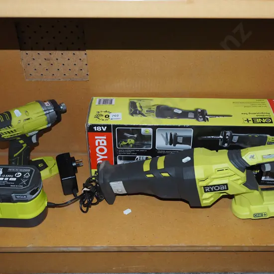 Ryobi battery powered reciprocating saw, impact driver, 1 battery and charger