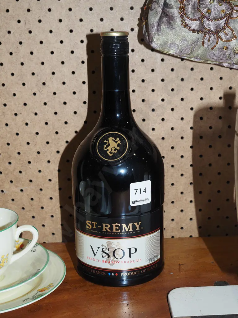 1L bottle St Remy French brandy Image 1++