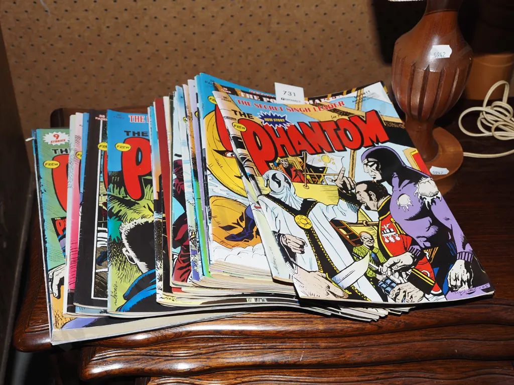 stack of Phantom comics Image 1++