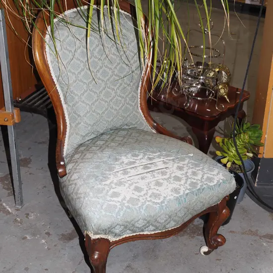 Victorian mahogany nursing chair on enamel casters - upholstery needs attention