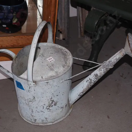 galvanised watering can