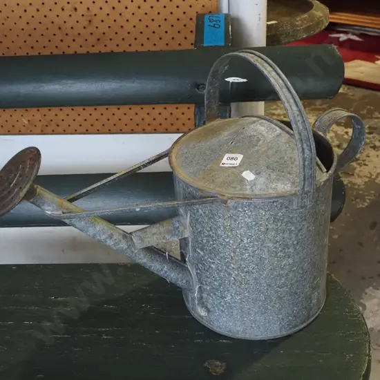 galvanised watering can