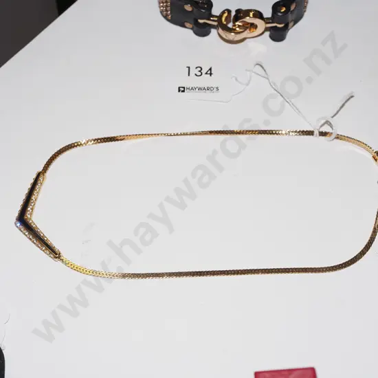 Swarovski gold tone black enamel CZ necklace 13gms