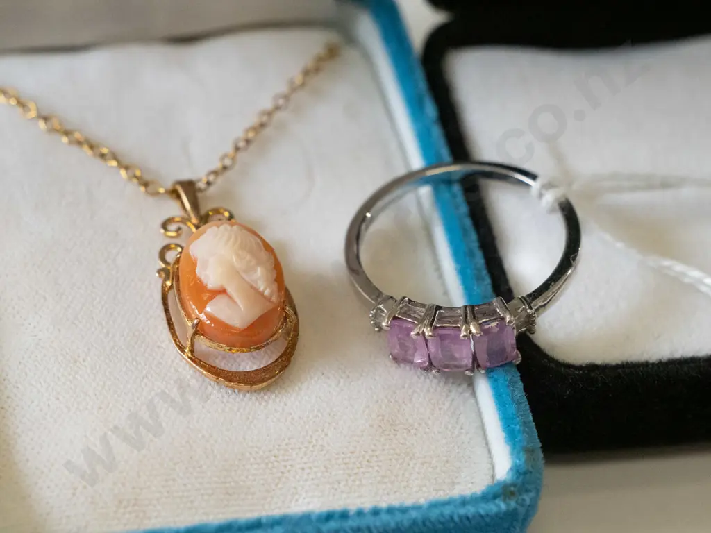sterling silver topaz ring 3gms and a gold plated cameo pendant on chain Image 1++