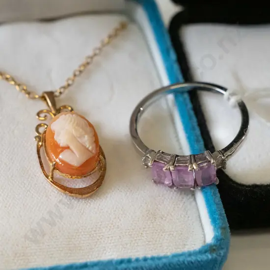 sterling silver topaz ring 3gms and a gold plated cameo pendant on chain