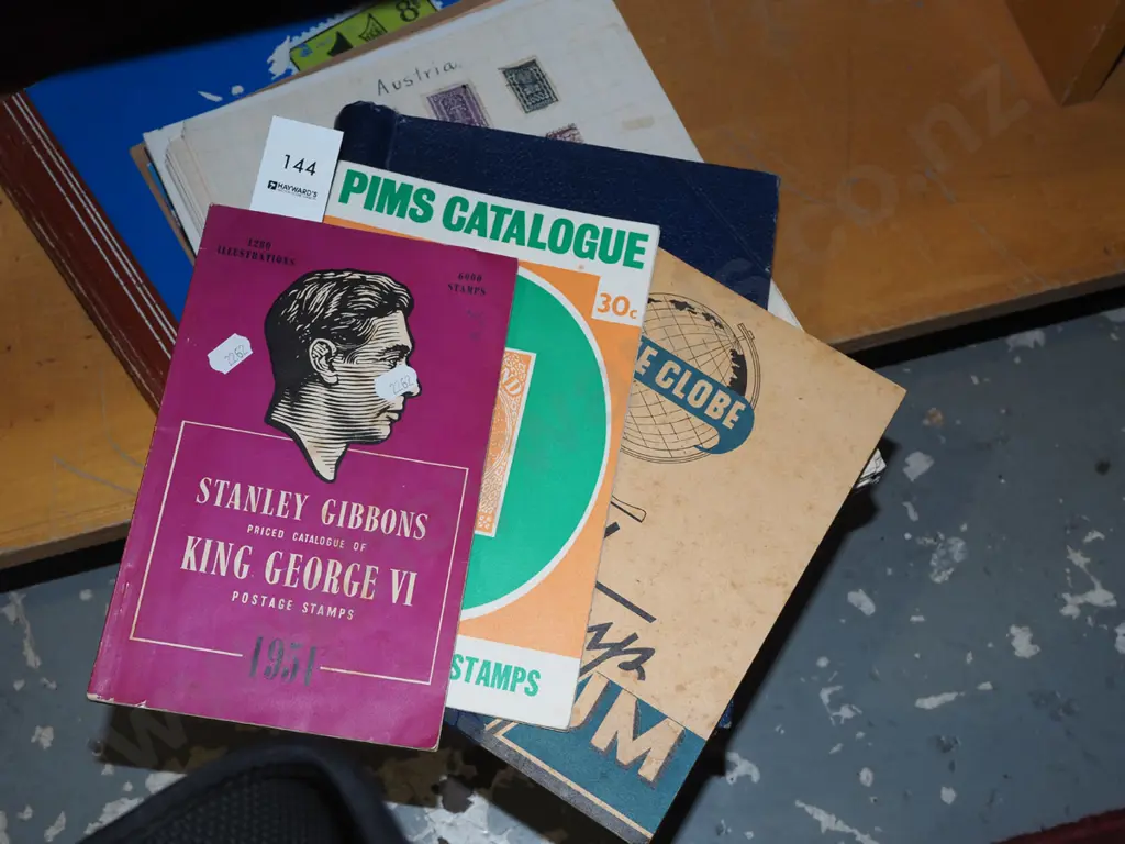 stamp albums & various publications Image 1++