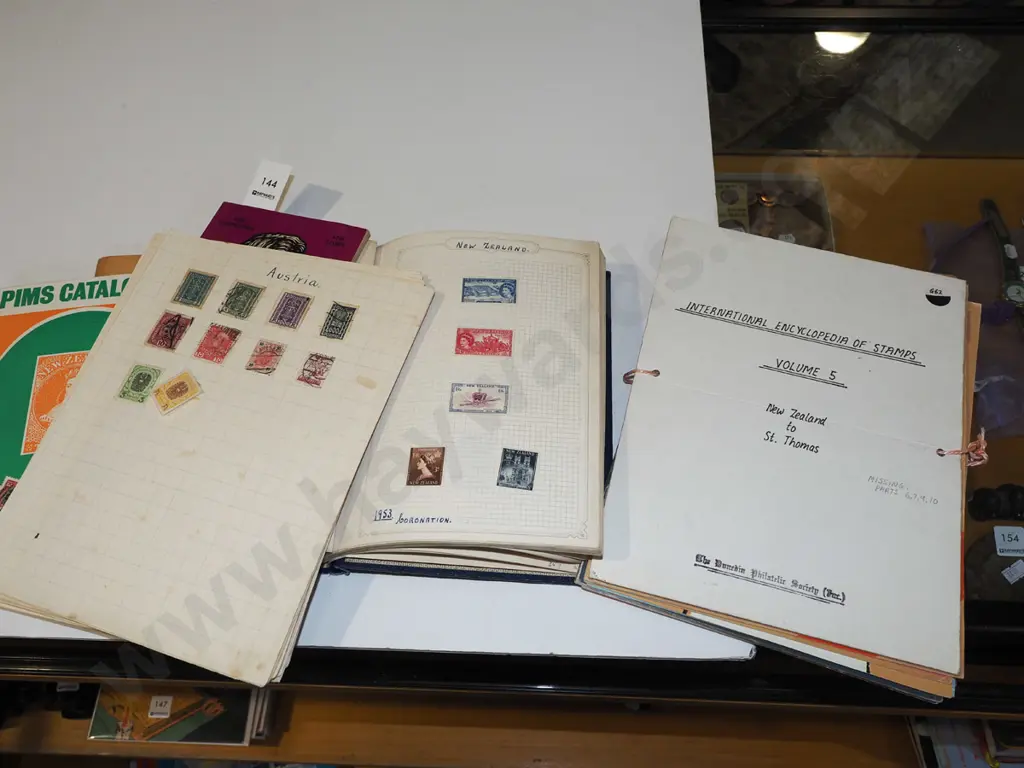 stamp albums & various publications Image 1++