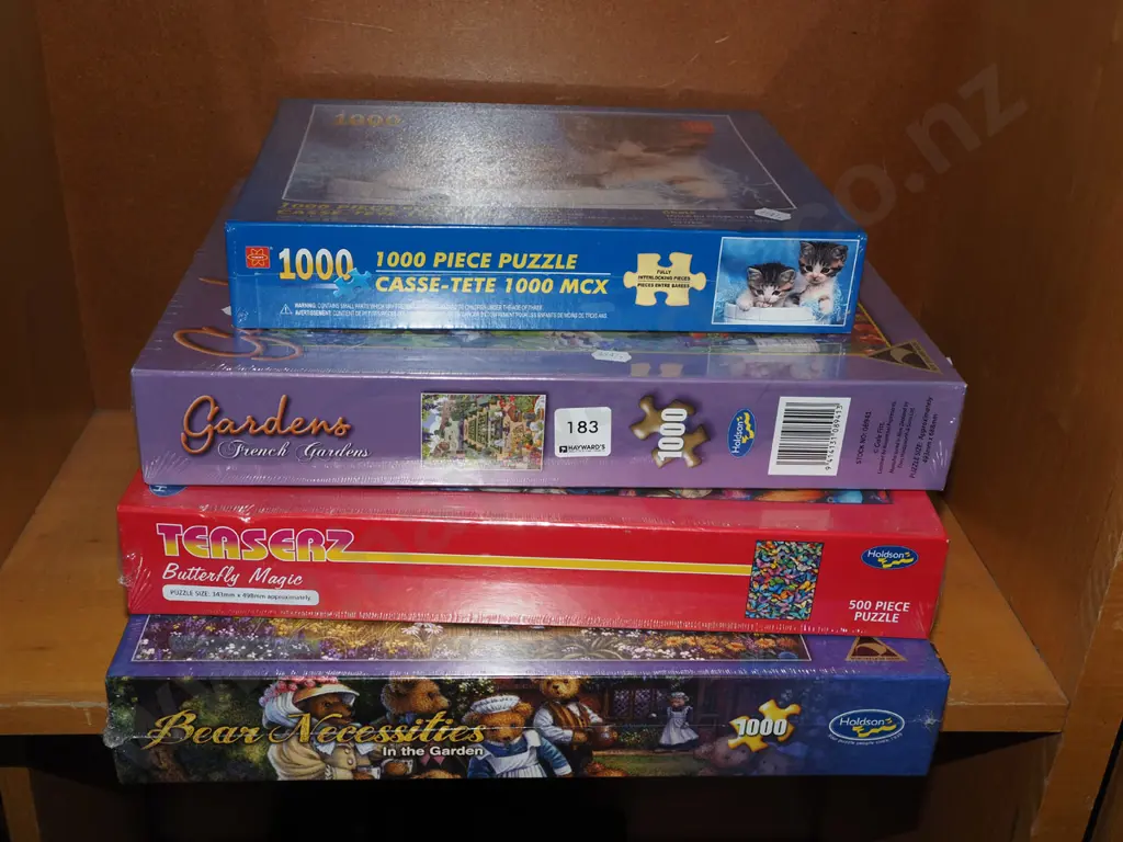 4x as new boxed puzzels Image 1++