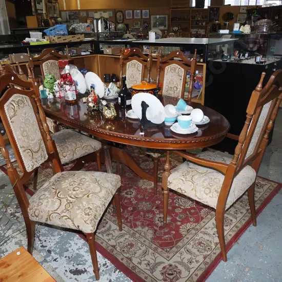 mahogany veneer extending pedestal dining table with 6 highback chairs including 2 carvers