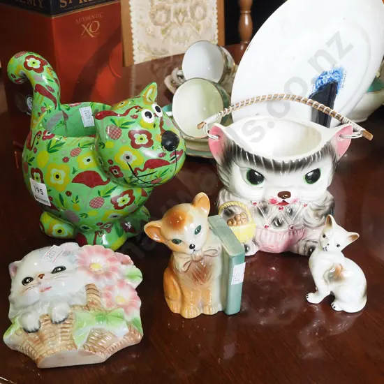 cat themed basket, jardiniere stand, bookend etc