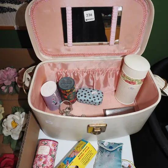 makeup case and contents; brushes etc