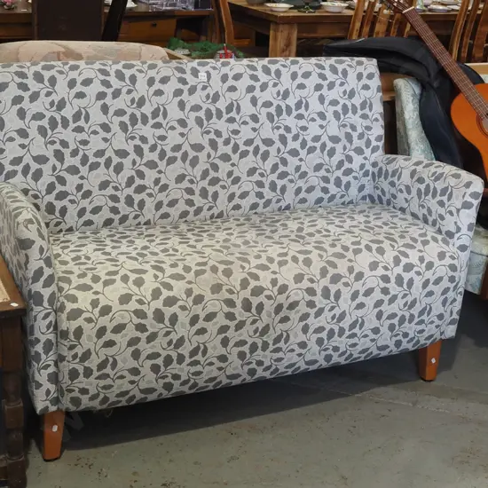 grey & white floral upholstered 2 seater settee - has cat scratches