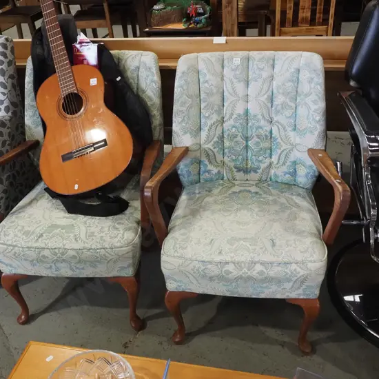 pair of cab leg, green & white floral upholstered armchairs, some wear to fabric & varnish needs attention