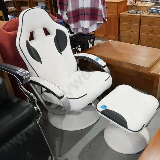 cream & black vinyl reclining, swivel armchair with matching footstool