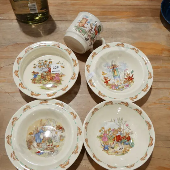 4x Royal Doulton bunnykins bowls, 1x Crown Lynn mug