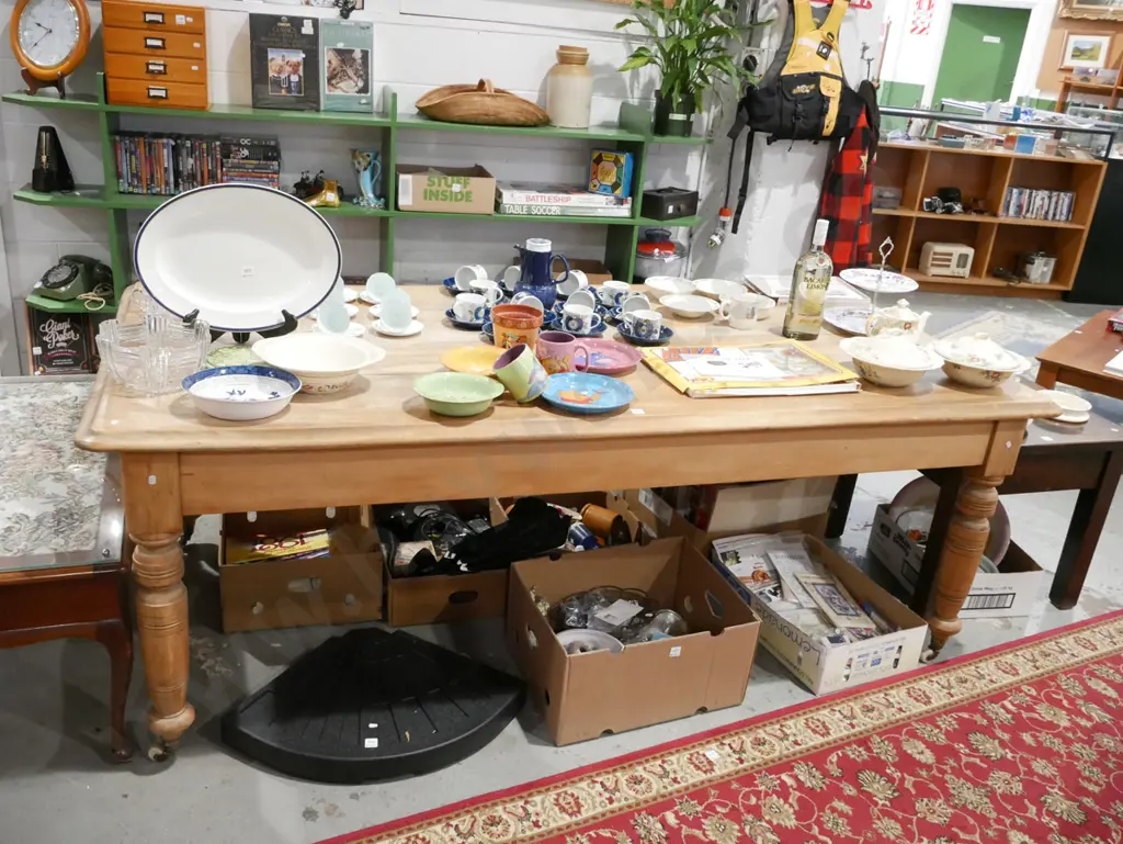 colonial turned leg kauri scrub top table on enamel casters - warping and discolouration Image 1++