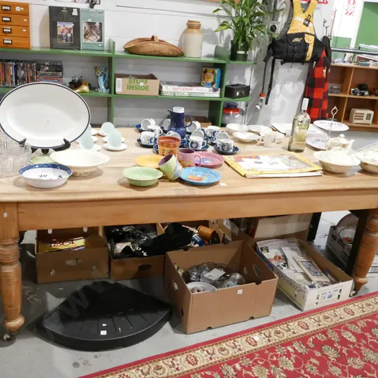 colonial turned leg kauri scrub top table on enamel casters - warping and discolouration