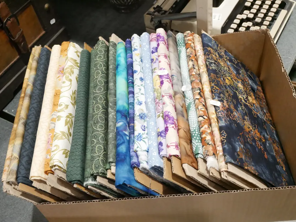 box of fabric pieces Image 1++