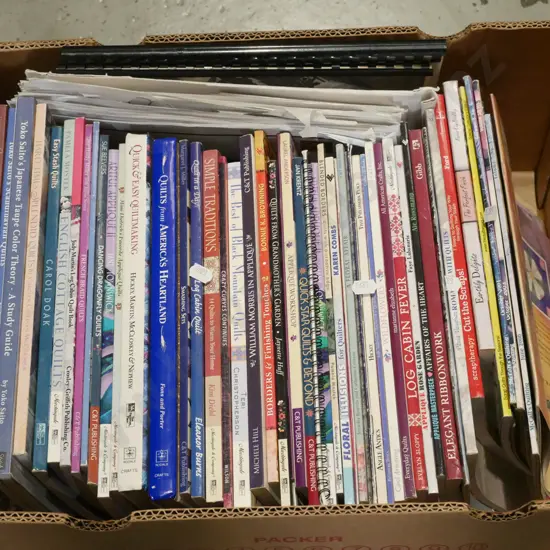 box of quilting and other craft books