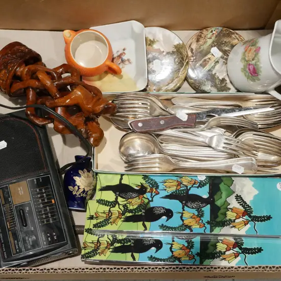 box; transistor radio, cutlery, tui prints etc