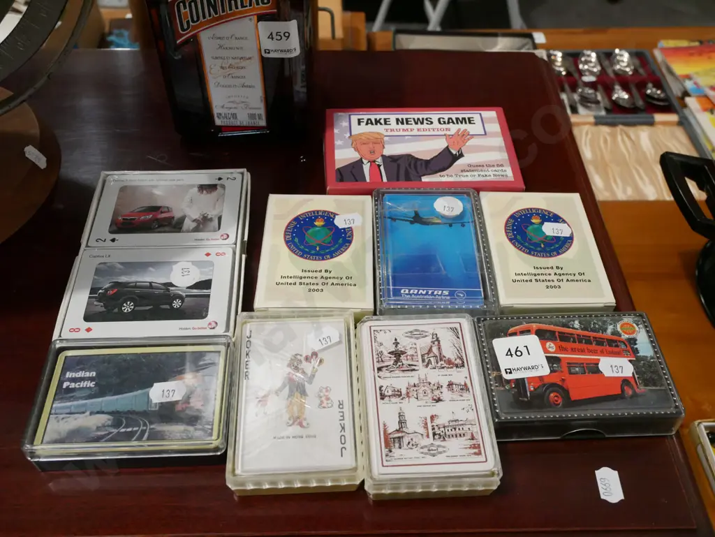 various playing cards including Fake News game, 2 packs of CIA Iraq War cards Image 1++