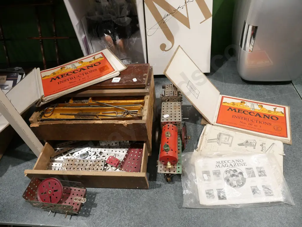 box of vintage Mecanno, model train and tender, instruction books Image 1++