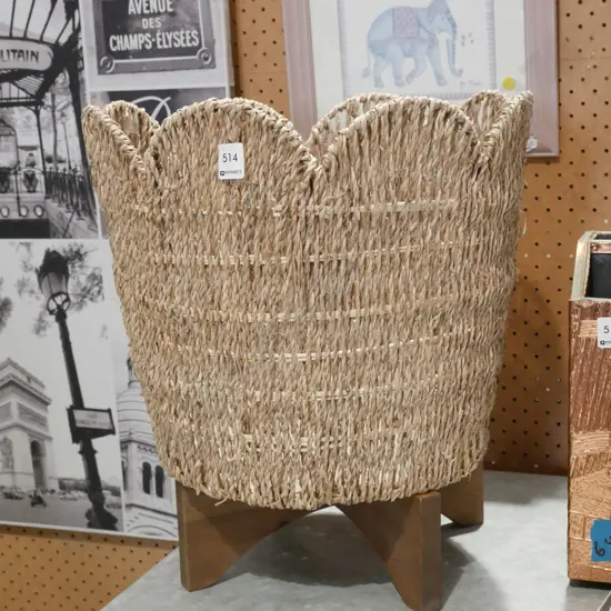 woven seagrass jardinier on wooden stand