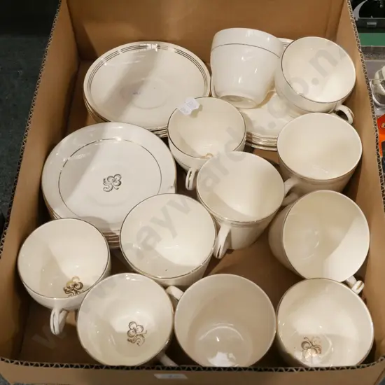 box of Phoenix Ware cups and saucers