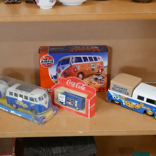yet to be assembled model of a VW camper van, Coca Colo model vehicle etc