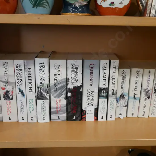 shelf of Brandon Sanderson books
