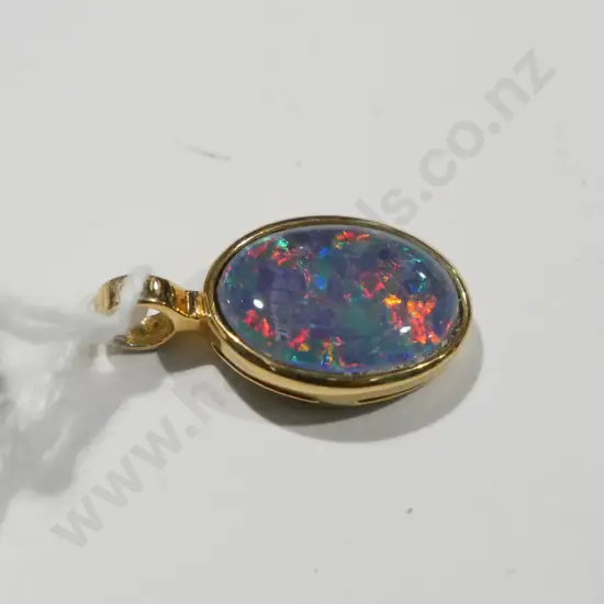 gold coloured metal opal pendant