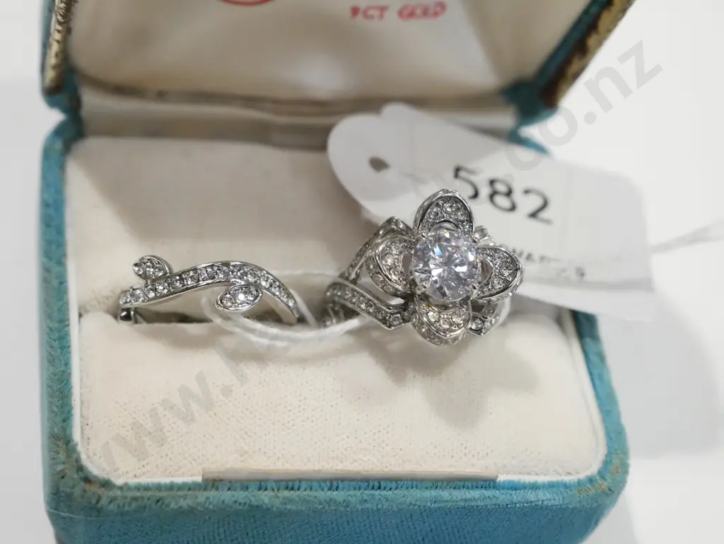 2x sterling silver rhodium plated rings 8gms Image 1++