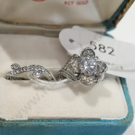 2x sterling silver rhodium plated rings 8gms