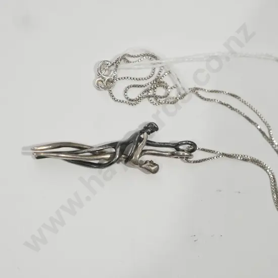 sterling silver embracing couple necklace