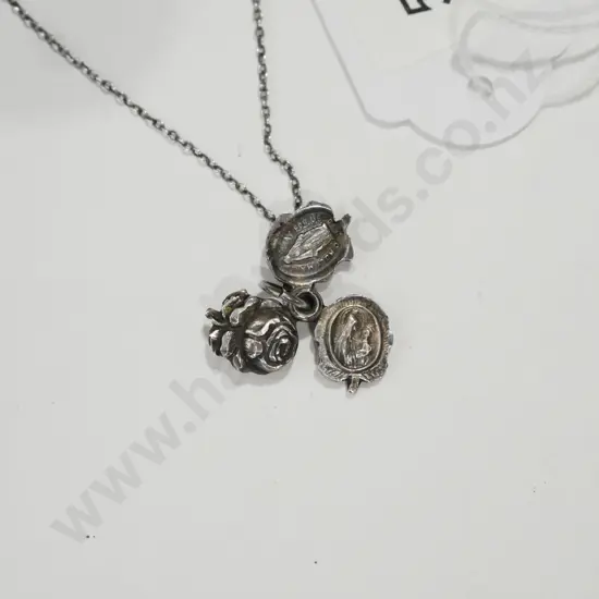 sterling 3 segment religious icon necklace.