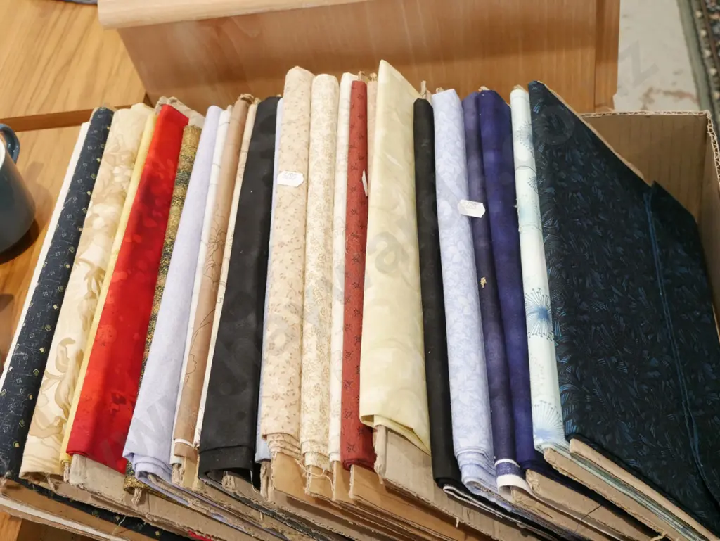 box of fabric pieces Image 1++