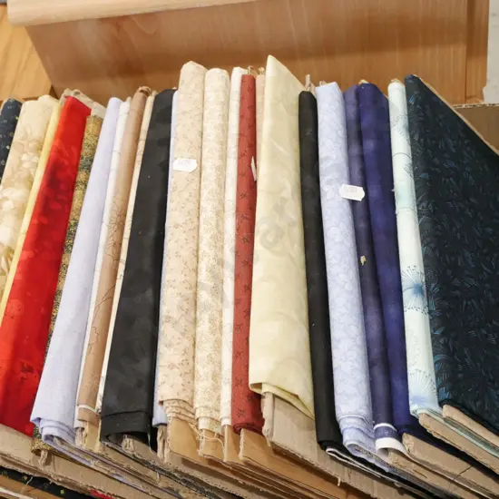 box of fabric pieces