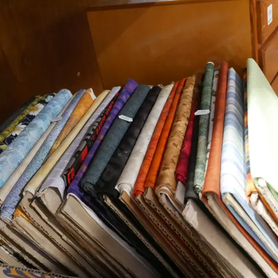 box of fabric pieces