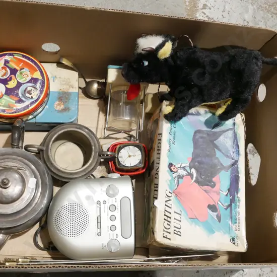 box; teapot, alarm clock, remote toy bull etc