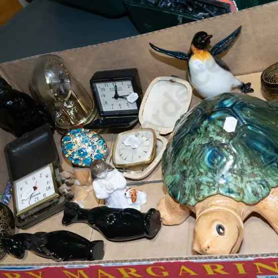 box; penguin, turtle, cat and other figurines, anniversary clock, etc.